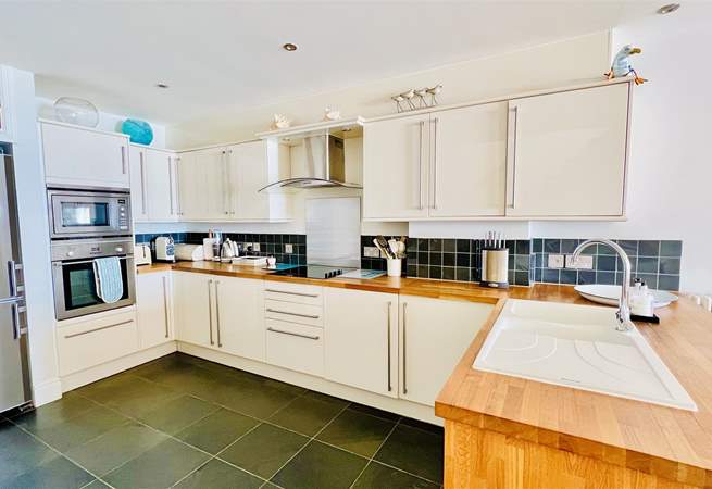 The kitchen is well designed and equipped. 