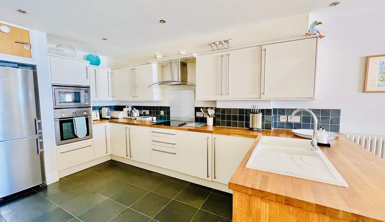 The kitchen is well designed and equipped. 