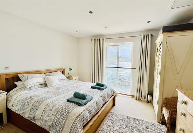 The principal bedroom has magical views and a super-king size bed, plus an en suite shower-room. 