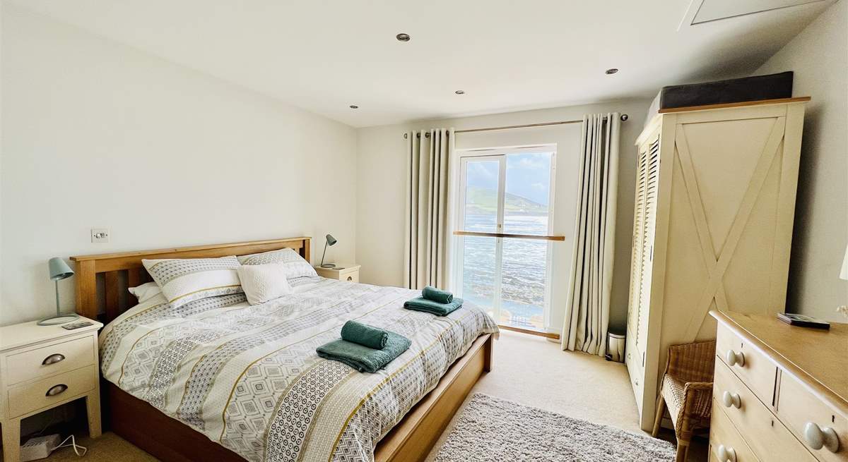 The principal bedroom has magical views and a super-king size bed, plus an en suite shower-room. 