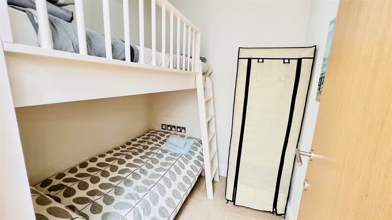 The children will love the bunk-beds in this room.