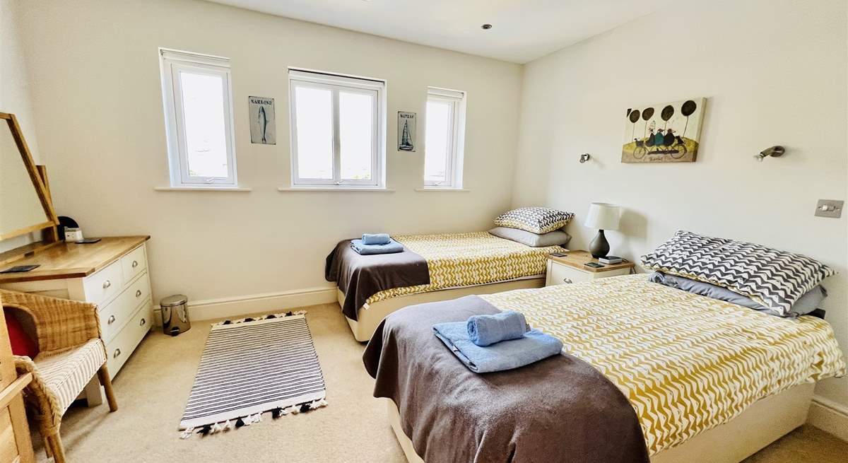 Bedroom 3 has twin beds, ideal for children or adults. 