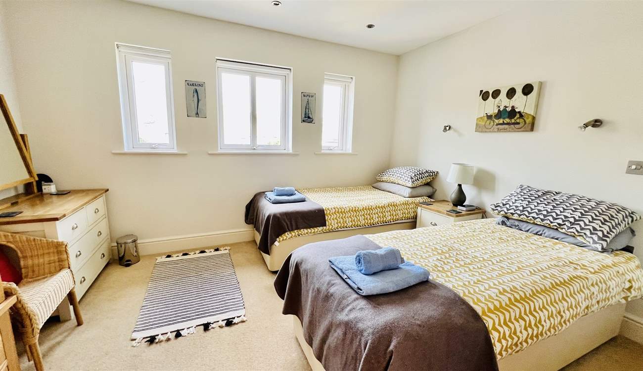 Bedroom 3 has twin beds, ideal for children or adults. 