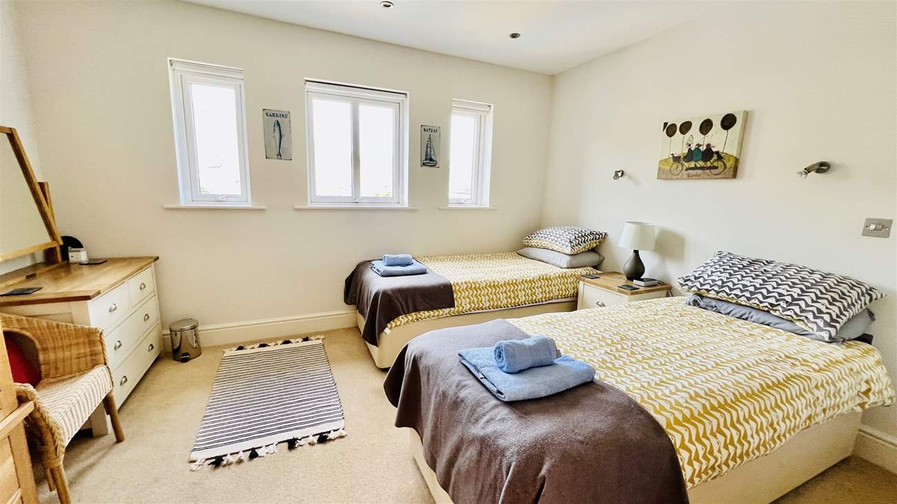Bedroom 3 has twin beds, ideal for children or adults.