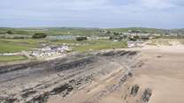 Surfside (to the left of the picture) is in the most fantastic location looking across Croyde Bay.