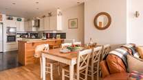 Gather everyone around the table and chat about the adventures of the day. 