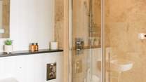 Bedroom 2 has its own en suite shower-room - perfect for rinsing sandy toes.
