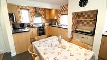 The kitchen/diner has all you need to cook a holiday meal. 