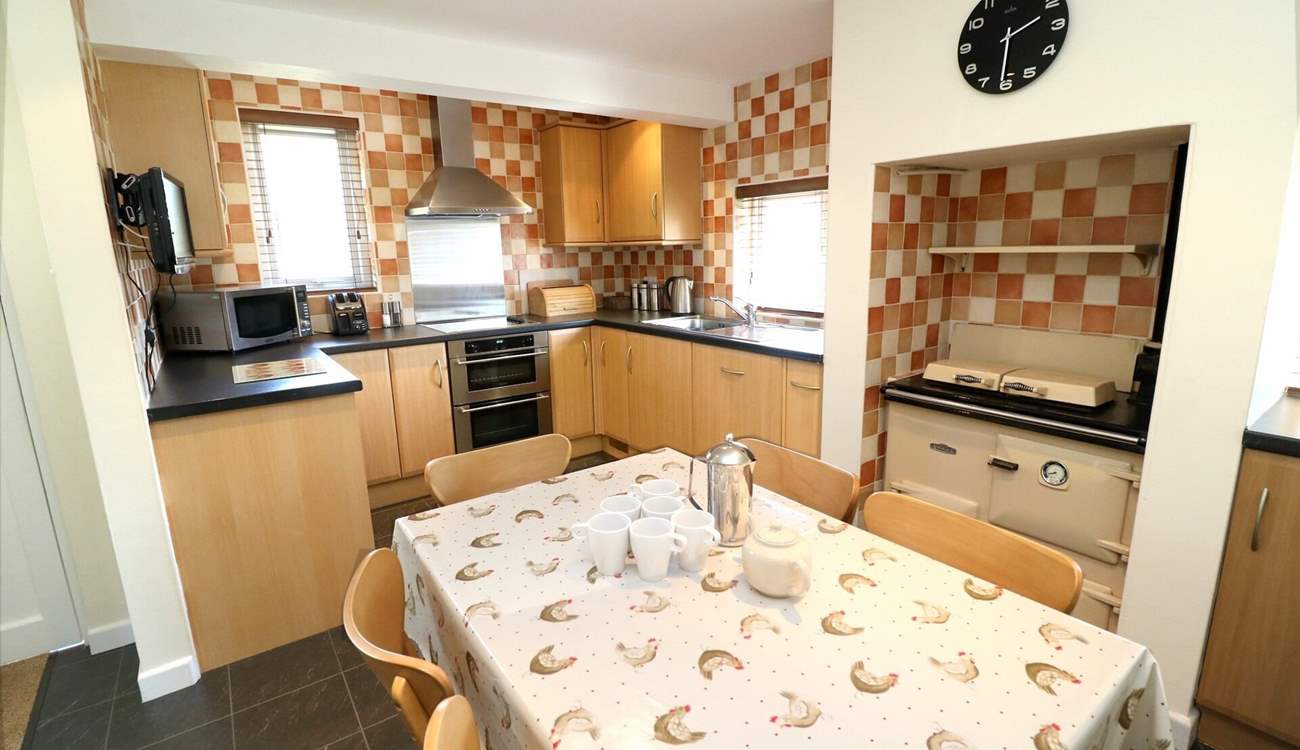 The kitchen/diner has all you need to cook a holiday meal. 