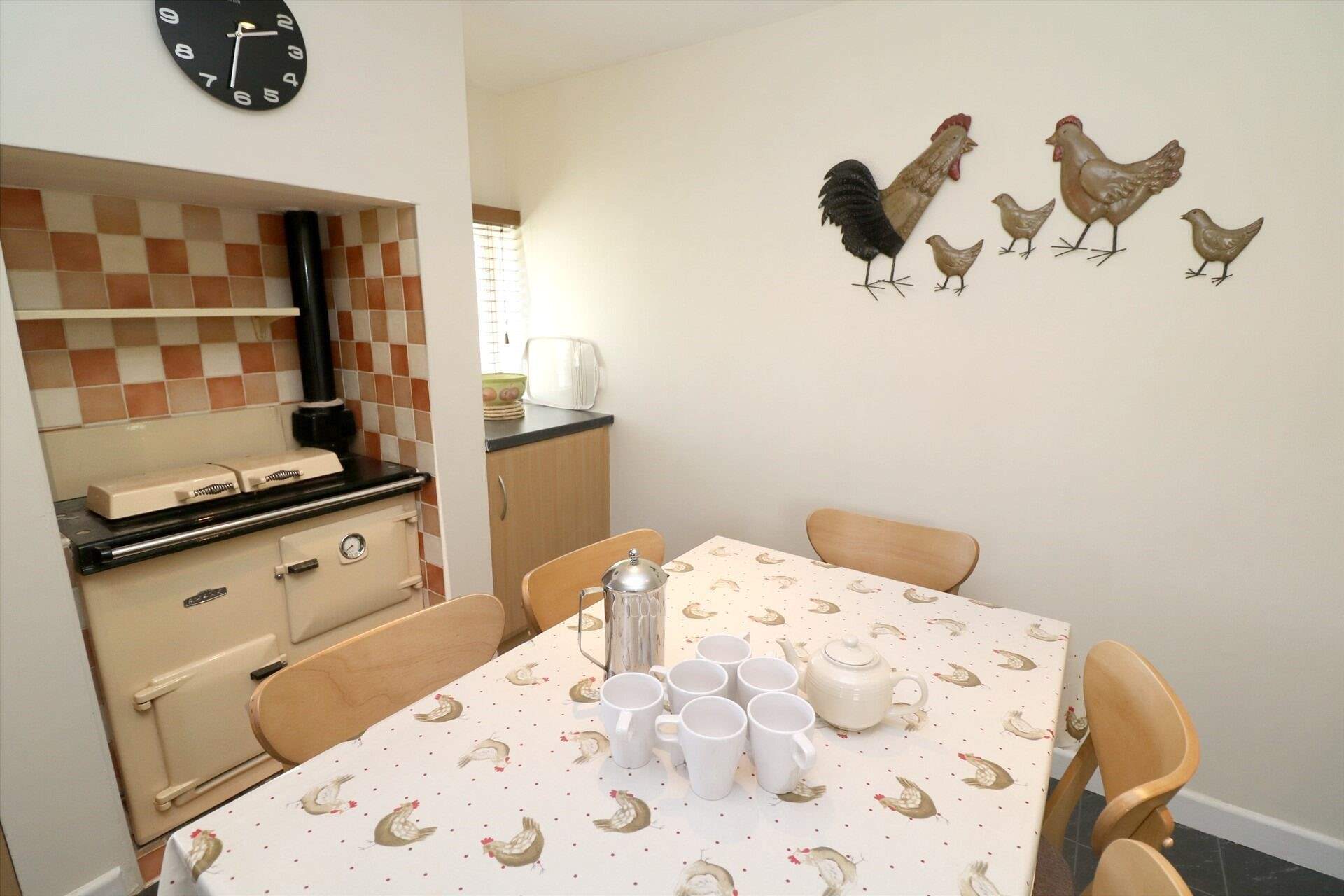 The kitchen has a gas-fired Aga. 