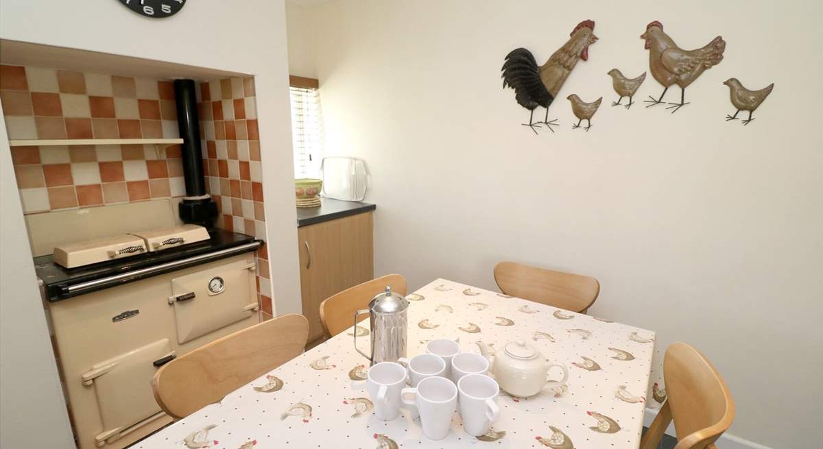 The kitchen has a gas-fired Aga. 