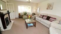 The comfortable sitting-room has a Smart TV.
