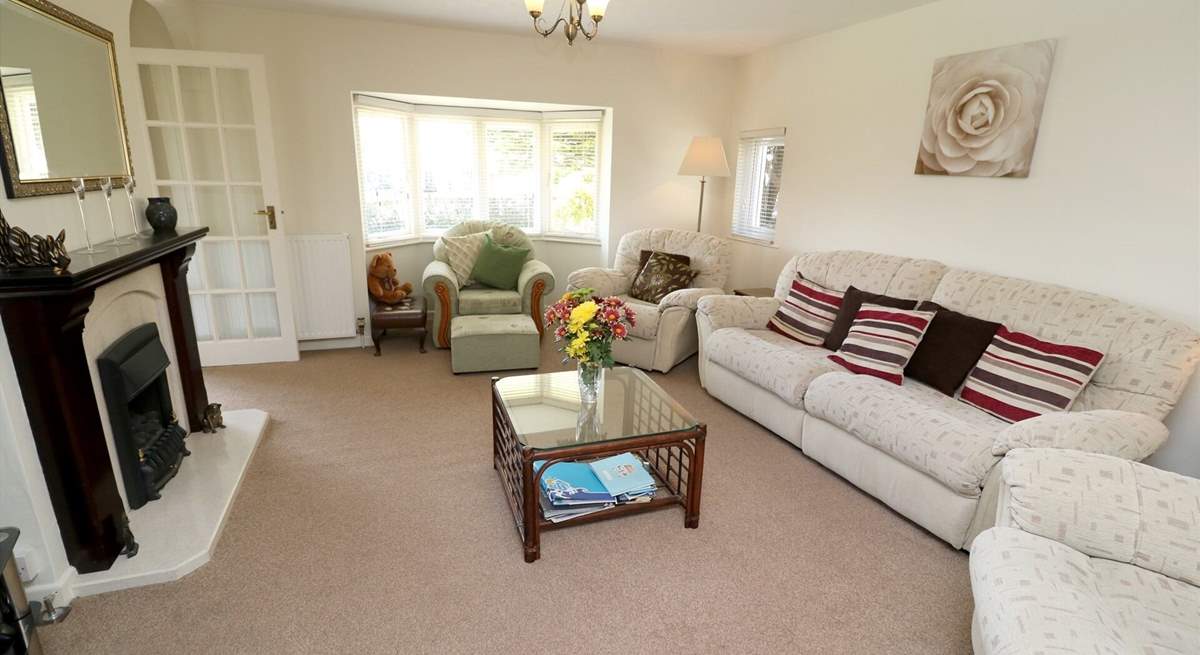 The comfortable sitting-room has a Smart TV.