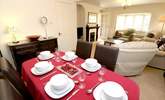 The sitting/dining-room has room for everyone.  - Thumbnail Image