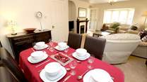 The sitting/dining-room has room for everyone. 