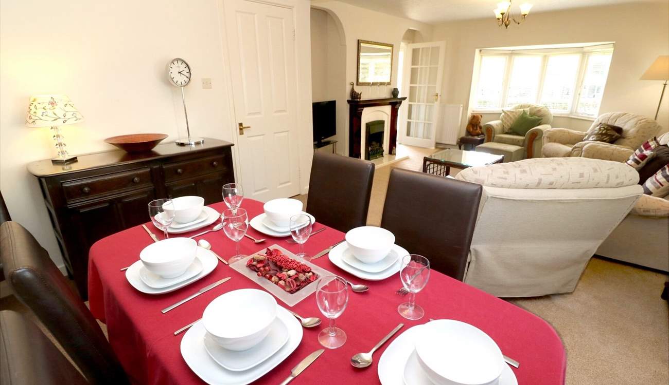 The sitting/dining-room has room for everyone. 