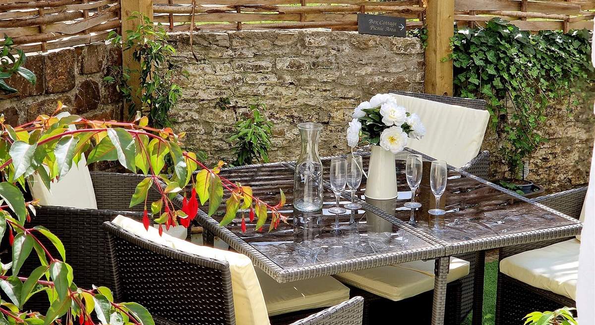 Al fresco dining in the secluded garden. 