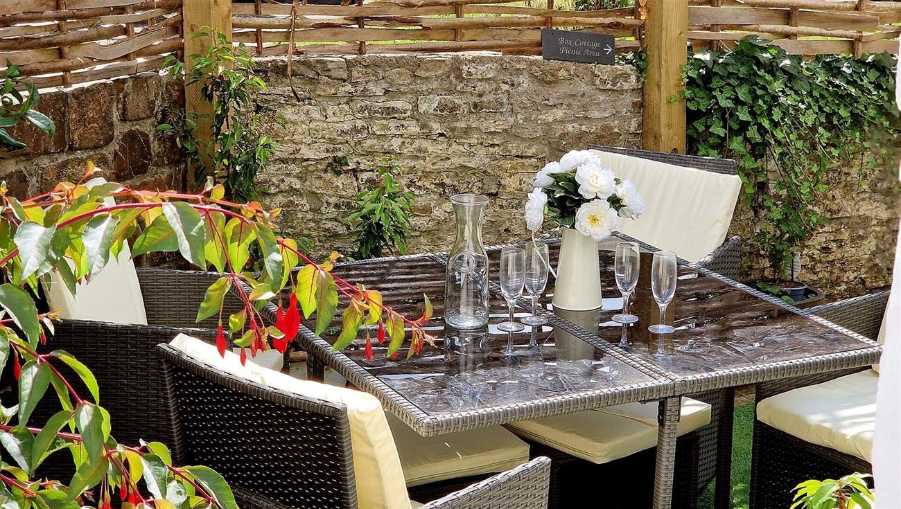 Al fresco dining in the secluded garden.