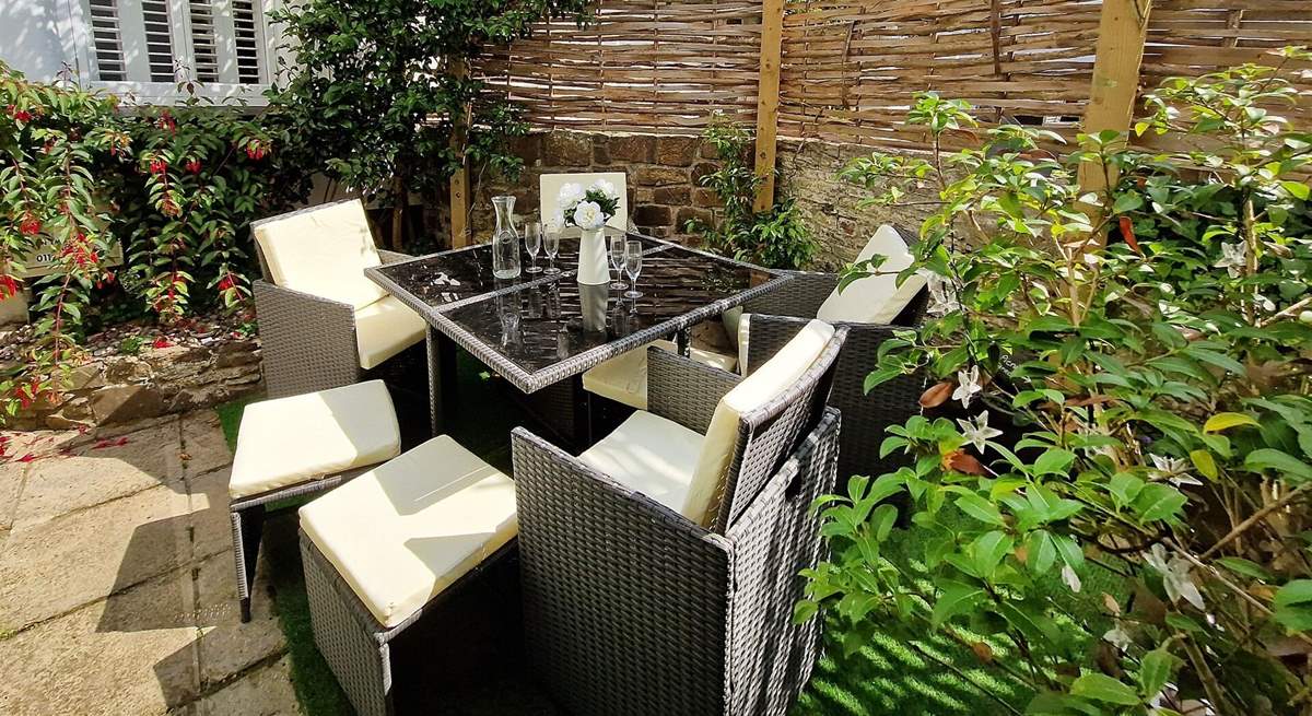 Sit in the secluded garden and enjoy al fresco dining. 