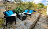 There is also an additional table and chairs on the patio.  - Thumbnail Image