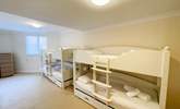 Bedroom 1 is on the first floor with twin bunk-beds. - Thumbnail Image