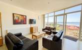 Sink into the sofa and soak up the views. - Thumbnail Image