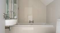 The family bathroom sits on the landing just outside of bedroom 3.