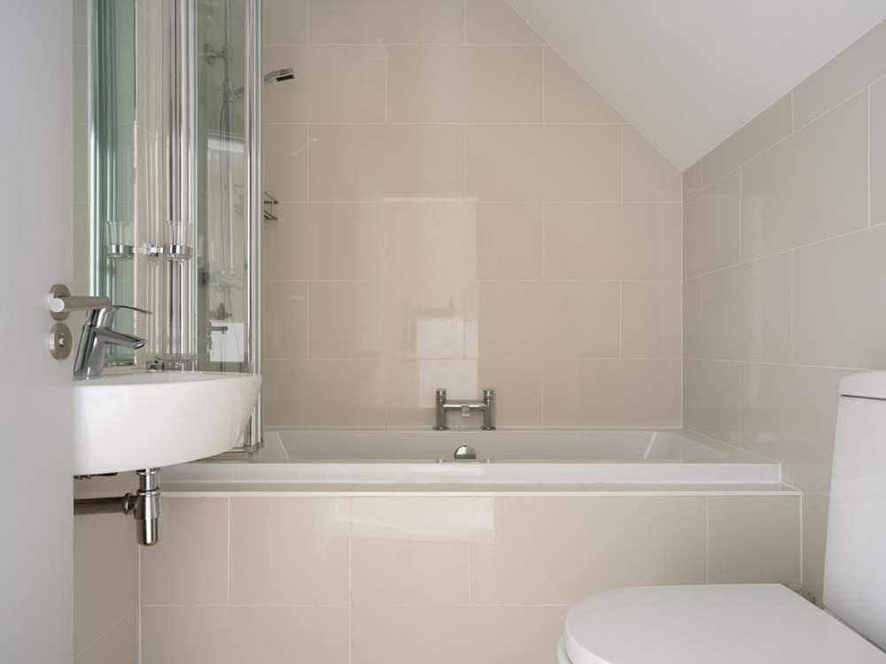 The family bathroom sits on the landing just outside of bedroom 3.