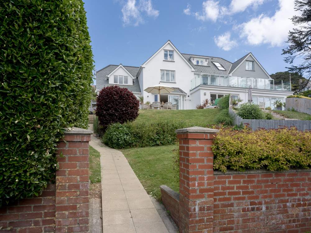 The sloping garden looking back up to the house on the left.