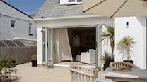 Head back out to the garden to take in the view of the beach as well as Lundy Island.