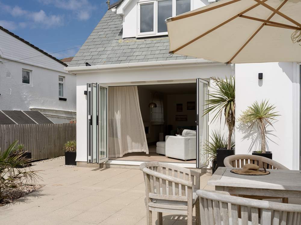 Head back out to the garden to take in the view of the beach as well as Lundy Island.