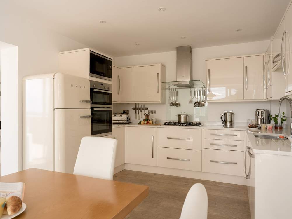 The sleek modern kitchen/diner.