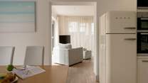 Head back through the sitting-room to the hallway where you will find a downstairs cloakroom, utility-room and the stairs to the first floor. 