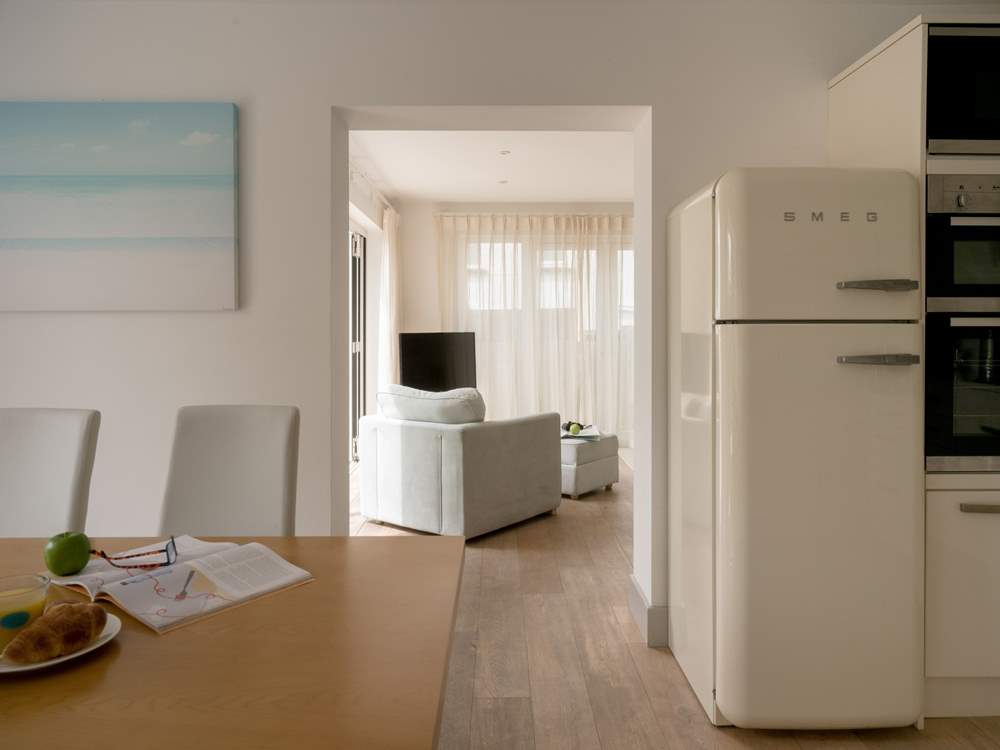 Head back through the sitting-room to the hallway where you will find a downstairs cloakroom, utility-room and the stairs to the first floor.