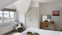 Bedroom 2 offers yet more wonderful views and benefits from an en suite shower-room. 