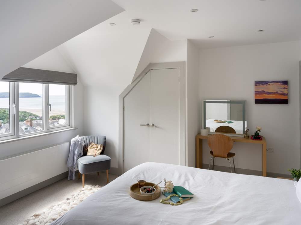 Bedroom 1 offers yet more wonderful views and benefits from an en suite shower-room.