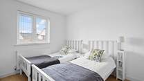 The twin bedroom is also located on the ground floor.