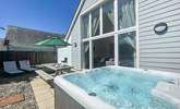 Sun-drenched days spent here. Please note there is an additional charge for the hot tub. - Thumbnail Image