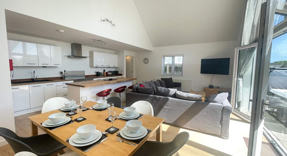 The open plan living space invites you to relax and unwind.