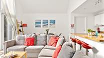The open plan living space invites you to relax and unwind.