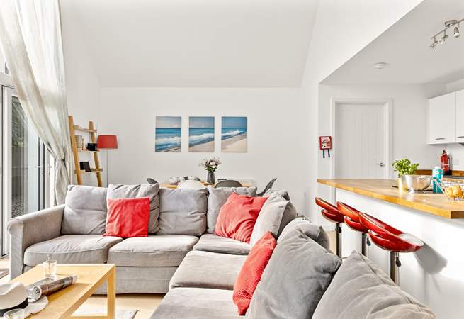 The open plan living space invites you to relax and unwind.