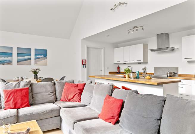 The cosy corner sofa offers the perfect spot to enjoy a family film night.