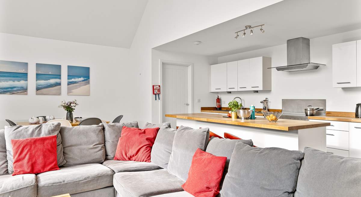 The cosy corner sofa offers the perfect spot to enjoy a family film night.