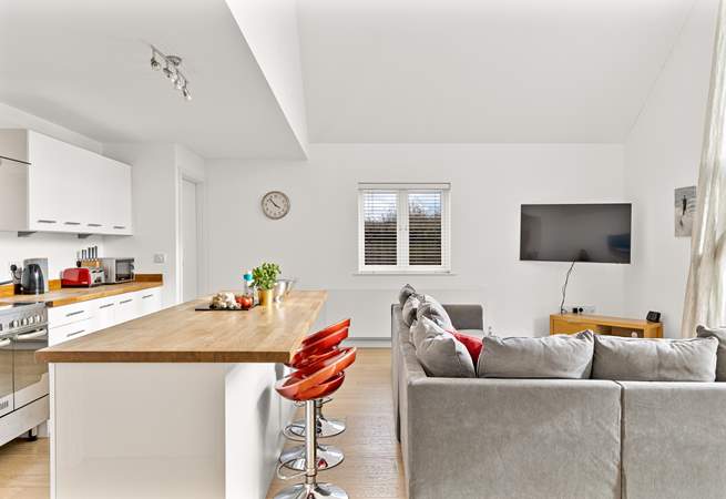 Take a perch and enjoy a chat with the chef for the night.