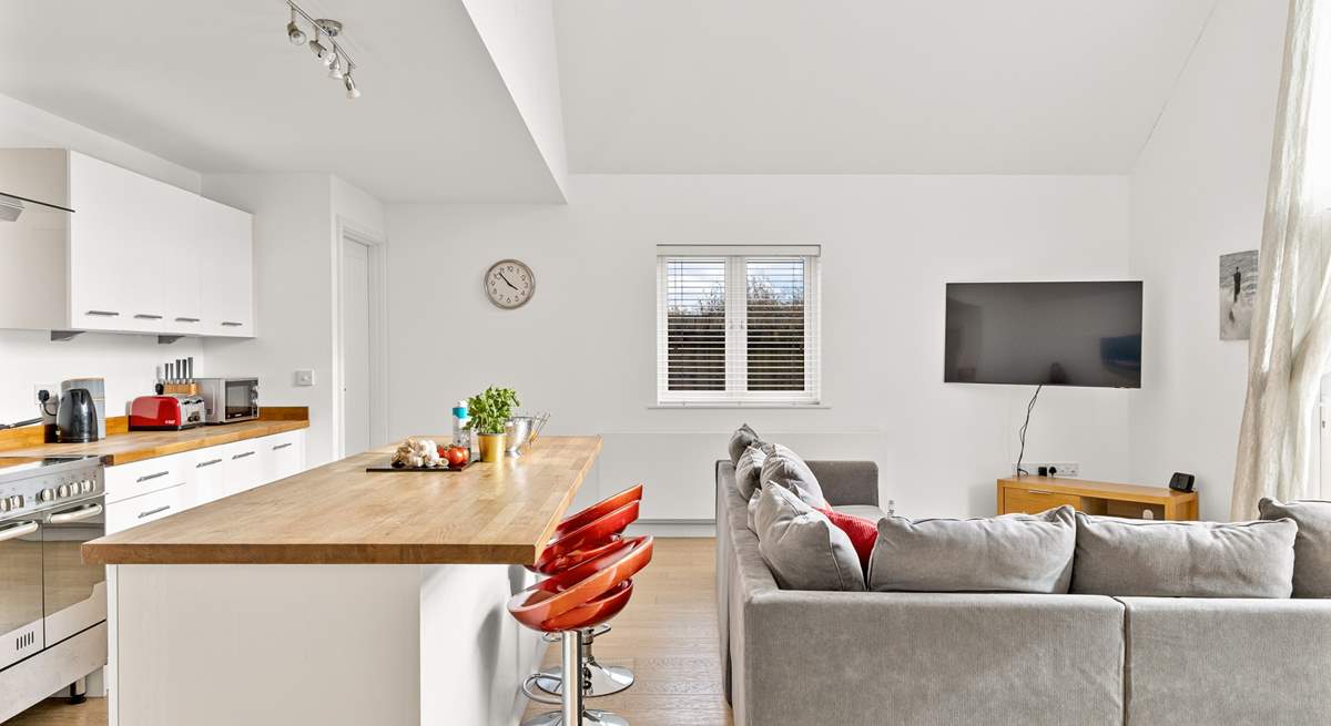 Take a perch and enjoy a chat with the chef for the night.