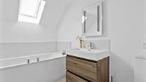 The family bathroom is on the third floor opposite the third bedroom.