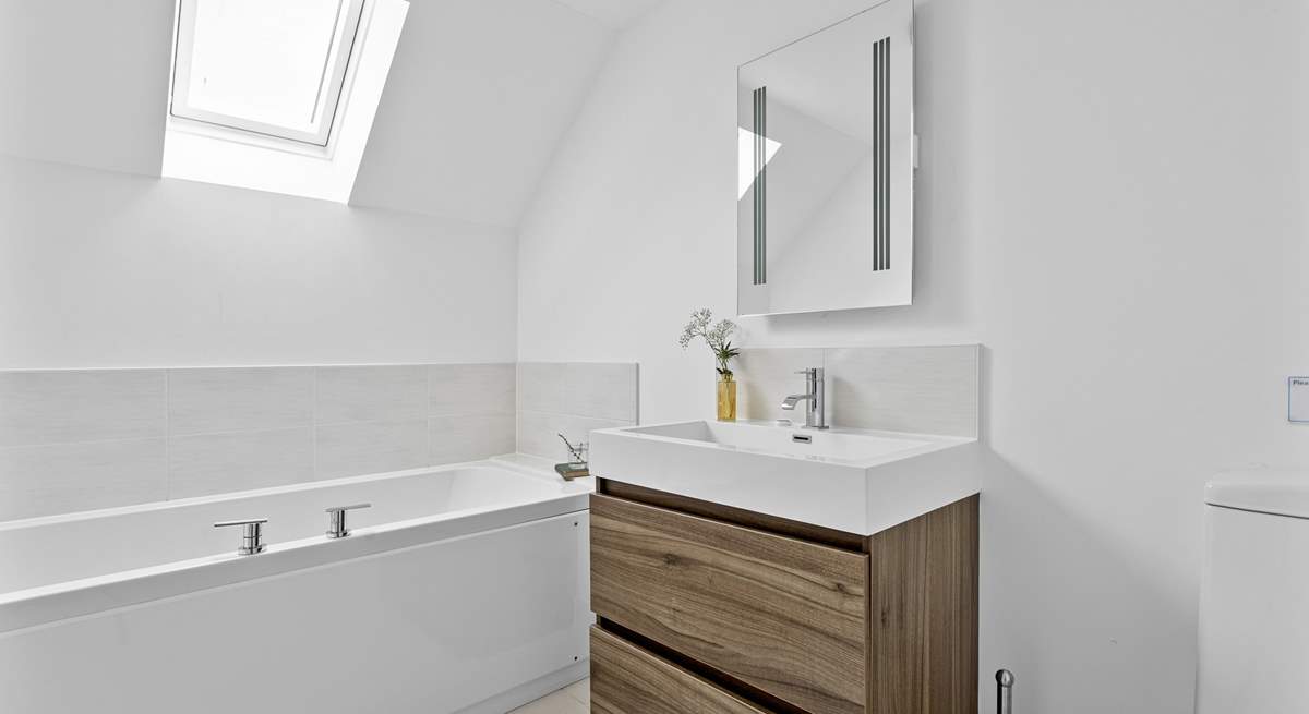 The family bathroom is on the third floor opposite the third bedroom.