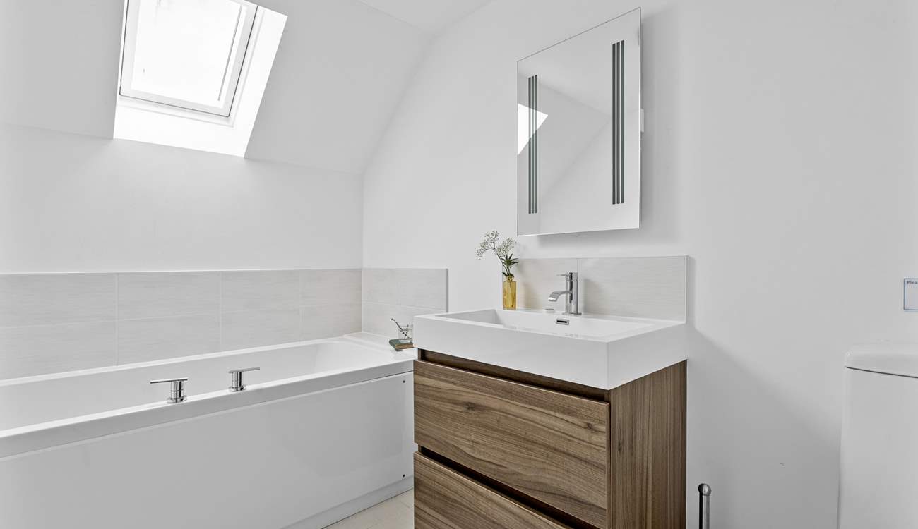 The family bathroom is on the third floor opposite the third bedroom.