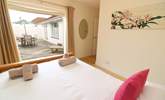 This gorgeous bedroom has access to the decked area. - Thumbnail Image