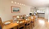 Gather round the table for a holiday dinner.  - Thumbnail Image